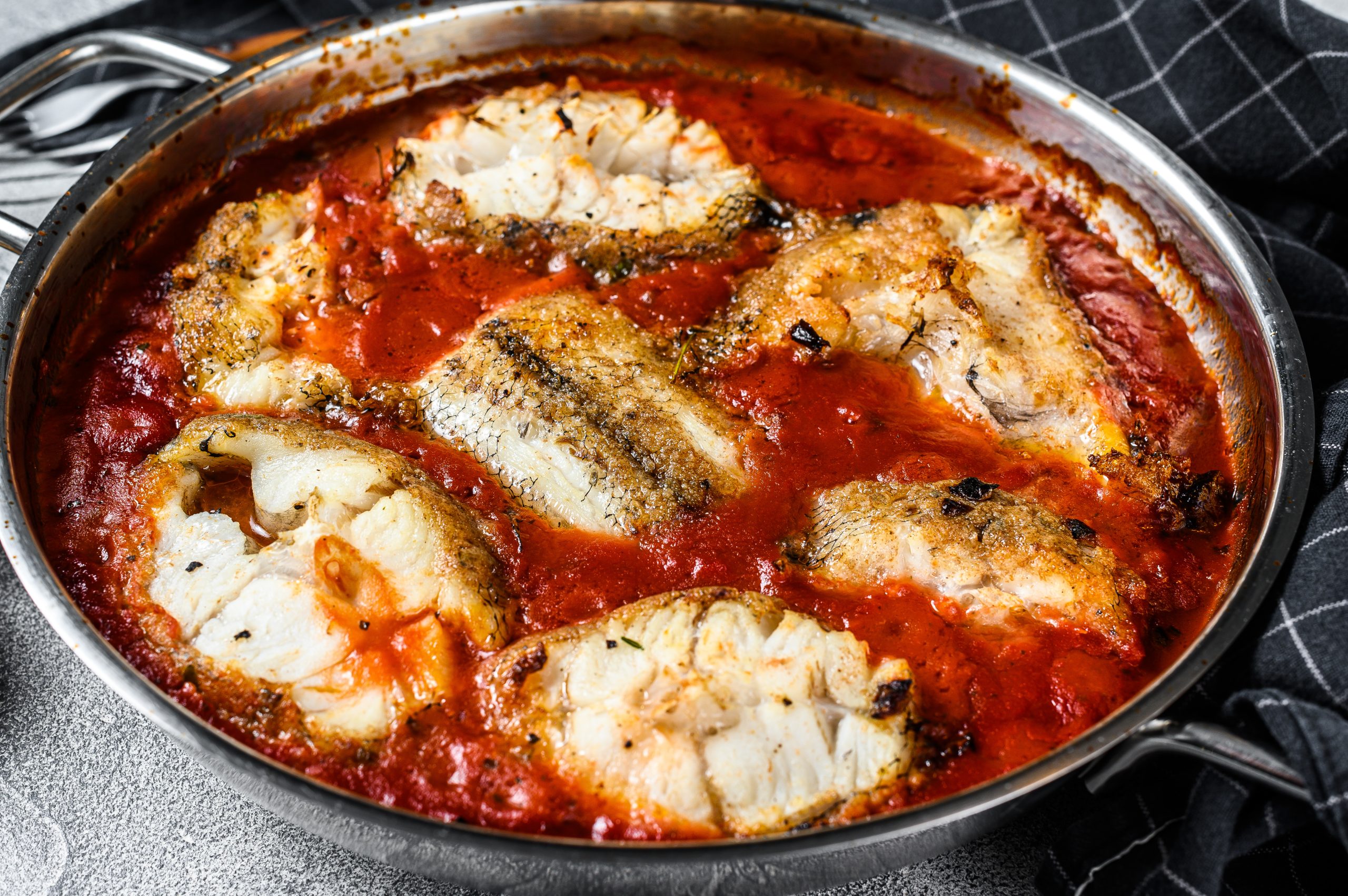 Merluza al Horno con Tomate